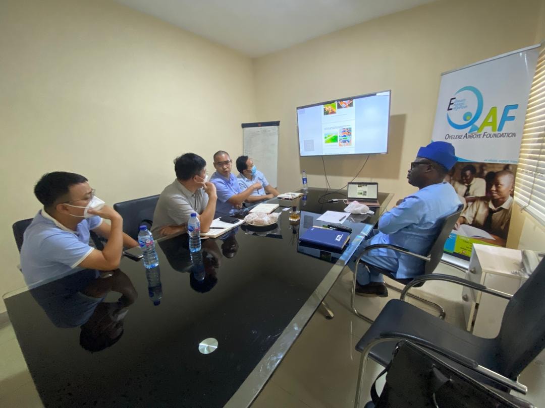 Project partners gathered around a table for a planning discussion